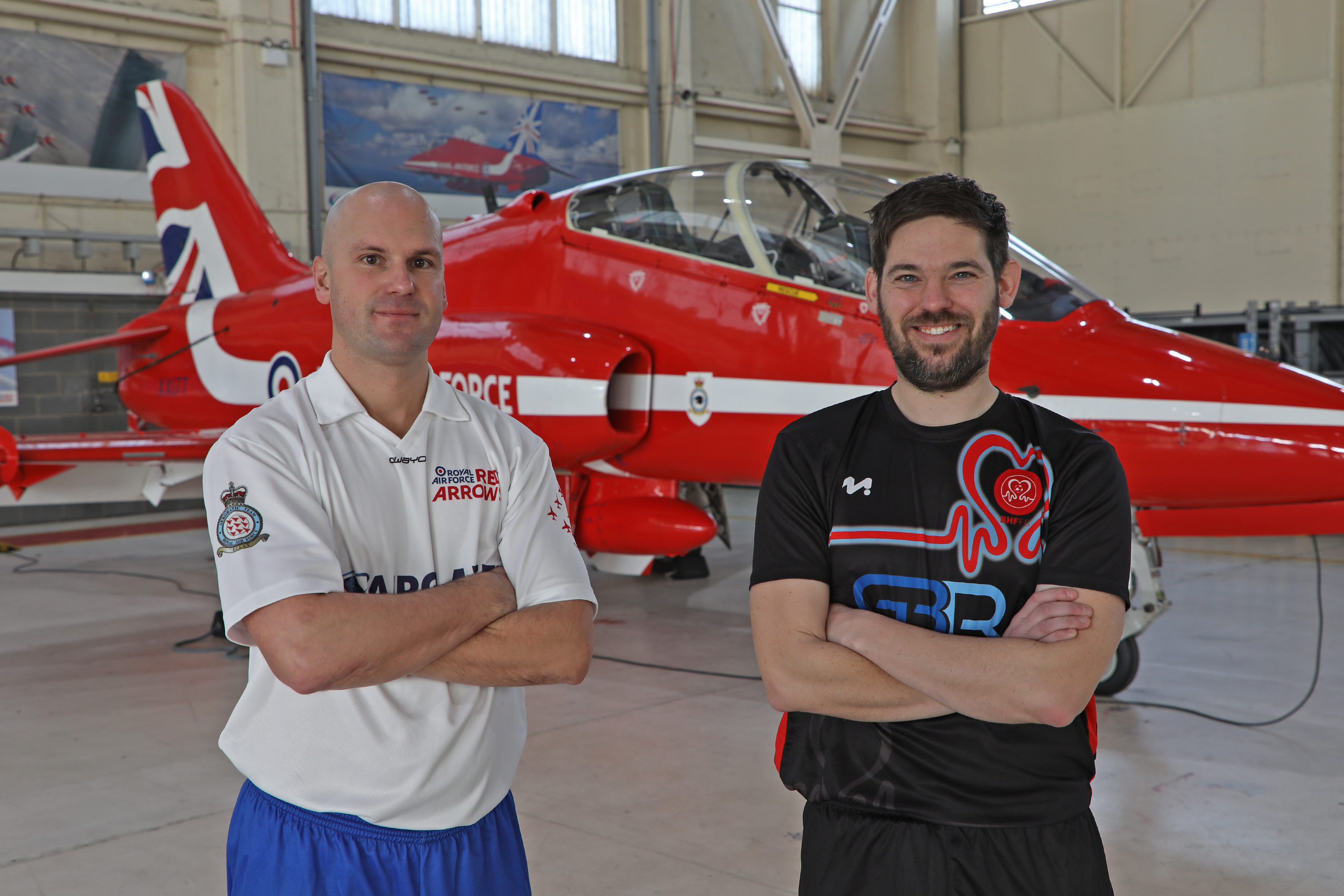 Manager of the Red Arrows XI, Sergeant David Marshall (left), with BHF FC's Gary Burr